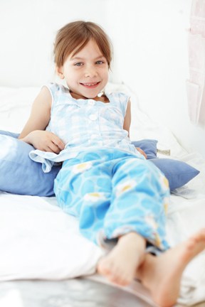 happy child using malem bedwetting alarm